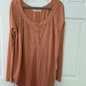 Two colors We The Free thermal tops.                 Price reflects for each top